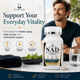 Nutriveska NAD+ Cellular Energy Support bottle on a table with a smiling man, for daily cellular energy and antioxidant support